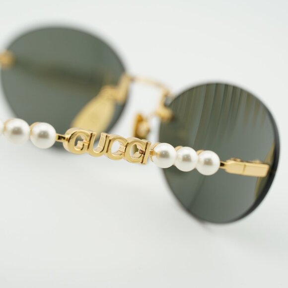 Gucci GG1922S 001 Sunglasses Gold with White Pearl Oval Frame, Grey Lenses main image 4